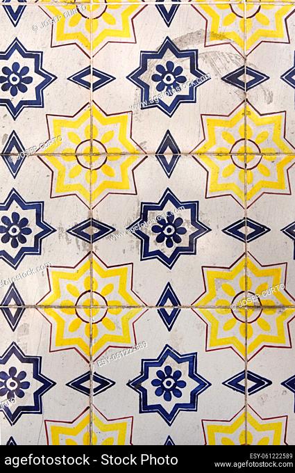 old tiles in Portugal, blue, yellow, and white color, photography takes in buildings of Portugal