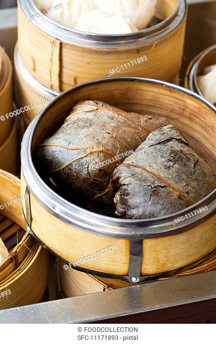 Lotus Leaf Rice Wraps in a Bamboo Steamer