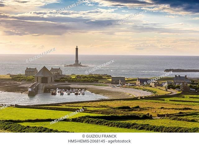 France, Manche, Cotentin, Cap de la Hague, Auderville, Goury harbour and the octogonal sea rescue station, Goury lighthouse in the background