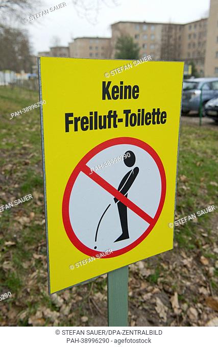 A sign reads 'No outdoor toilet' on a private field on Ruegen Island in Prora,  Germany, 23 April 2013. Photo: STEFAN SAUER | usage worldwide