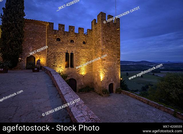 Montsonís Castle illuminated at night and at blue hour (La Noguera, Lleida, Catalonia, Spain)