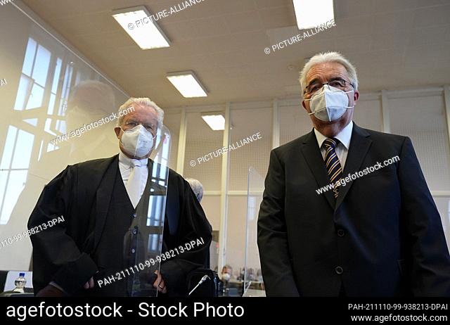 10 November 2021, Hamburg: The former head of the North District Office, Harald Rösler (r), stands next to his lawyer Johann Schwenn at the beginning of the...