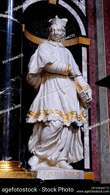 The statue of the Saint Charles Borromeo on the altar in the Franciscan Church of the Annunciation in Ljubljana, Slovenia