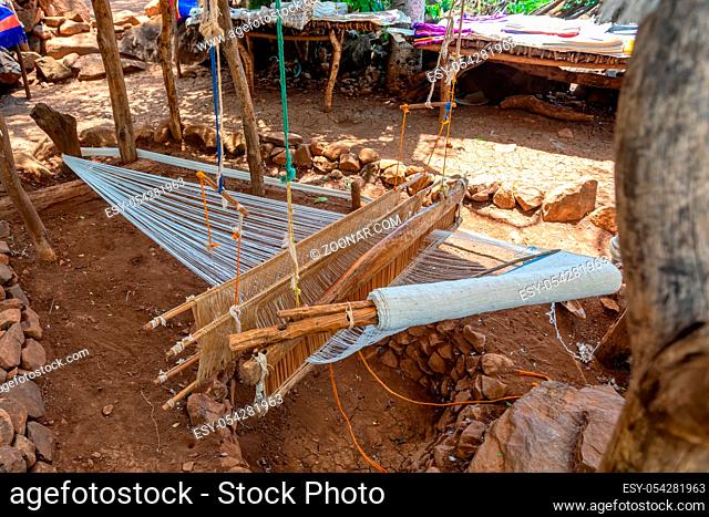Hand loom in Konso village, karat Ethiopia. Craftsmanship background. Detail of traditional vintage weaving hand loom