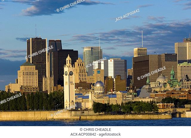 Early morning view of skyline with old Montreal in foreground, across St  Lawrence River, Montreal, Quebec, Canada