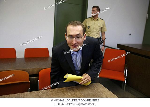 Defendant Markus R, a former employee of Germany's foreign intelligence agency (BND) arrives for his trial for espionage in a courtroom in Munich, Germany