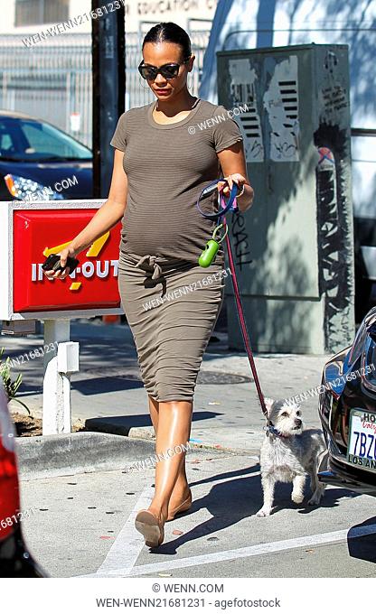 Zoe Saldana walks her dog Mugsy before visiting In-N-Out to grab some lunch Featuring: Zoe Saldana, Mugsy Where: Los Angeles, California