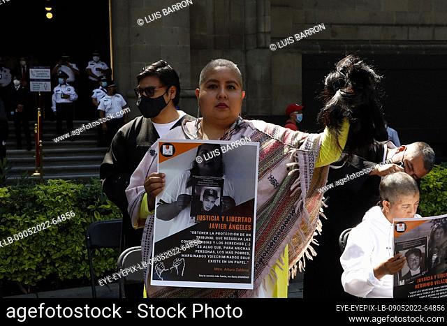 MEXICO CITY, MEXICO - MAY 9, 2022: Women of the collective 'Make my freedom count' take part during a rally while they shave of their heads as a protest to...