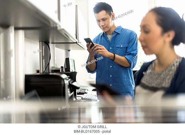 Business people using technology in office