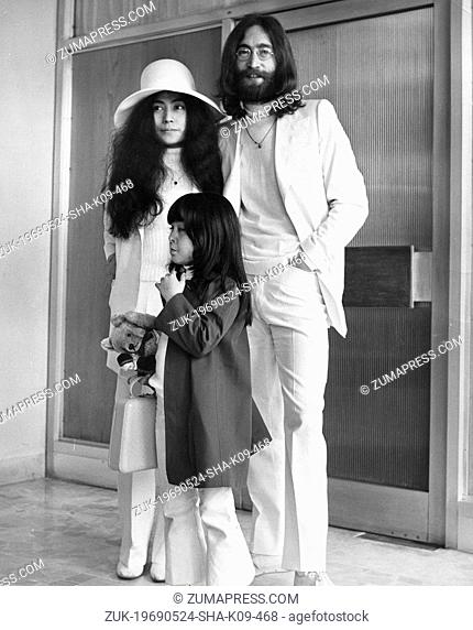 May 24, 1969 - London, England, U.K. - Beatles lead singer JOHN LENNON, his wife YOKO ONO and her 5 year old daughter by her previous marriage