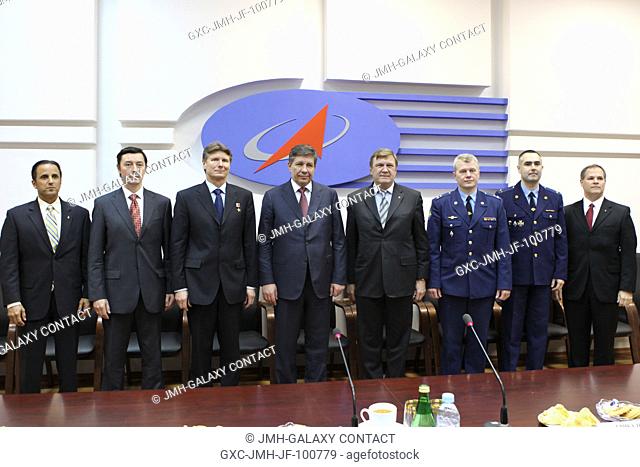 At the headquarters of the Russian Federal Space Agency, Expedition 31 prime and backup crew members pose for a photo with Roscosmos officials