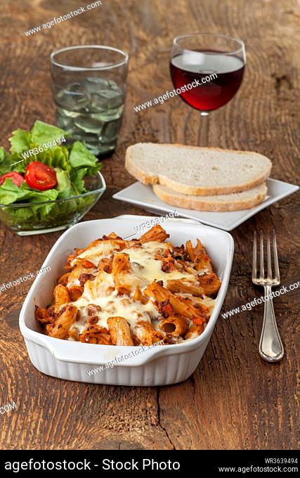 rigatoni pasta with sauce bolognaise and cheese