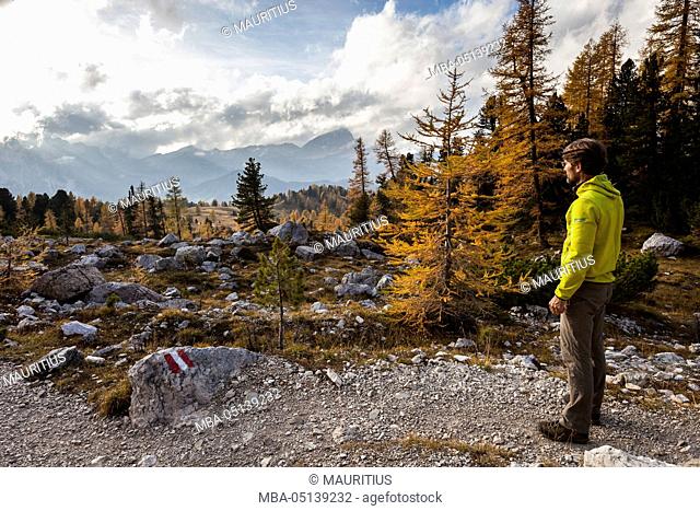 Europe, Italy, the Dolomites, South Tyrol, Gadertal, hikers on their way to the hospice and refuge Heiligkreuz