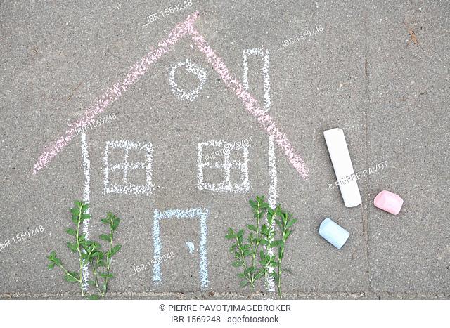 Chalk drawing on the street, house, symbolic image private home