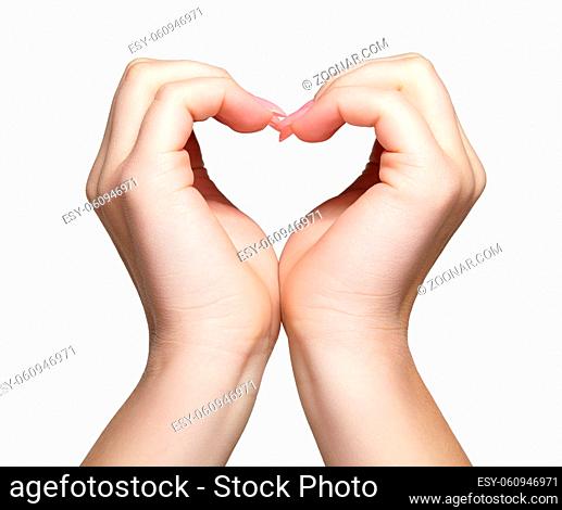 Hands shaped heart sign. Female hands with woman's professional natural perfect nails manicure isolated on white background