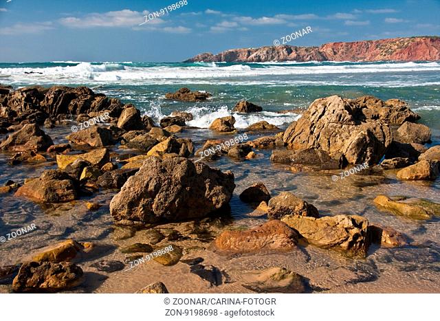 Praia do Amado - rocky coastline in Algarve / Portugal