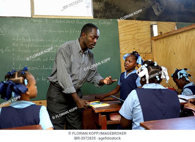 Teaching in a school for earthquake refugees, Fort National, Port-au-Prince, Haiti