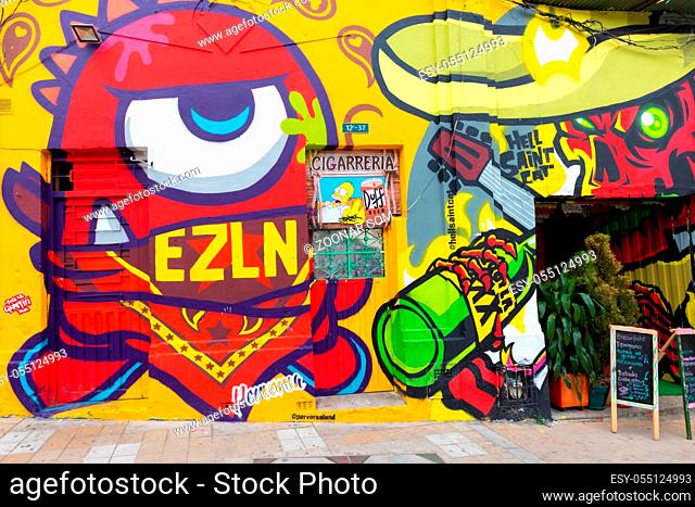 Bogota, Colombia March 31 This coloured mural has been realized on a wall of one of the ancient districts of Bogota named la Candaelaria appreciated for its...