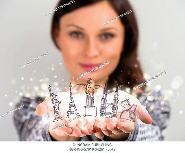 Closeup portrait of woman sharing virtual symbols of famous touristic destinations. Touristic service concept