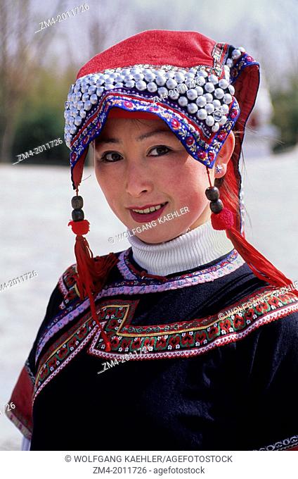 CHINA, BEIJING, CHINESE ETHNIC CULTURE PARK, PORTRAIT OF YI GIRL