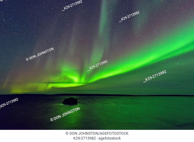 Aurora borealis (Northern lights) over Ennadai Lake, Arctic Haven Lodge, Ennadai Lake, Nunavut, Canada