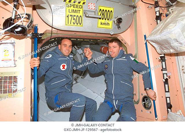 Two Soyuz Taxi crewmembers, South African space flight participant Mark Shuttleworth (left) and Flight Engineer Roberto Vittori of the European Space Agency...