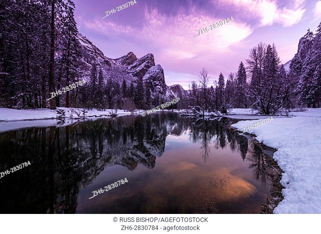 The Three Brothers above the Merced River in winter, Yosemite National Park, California USA