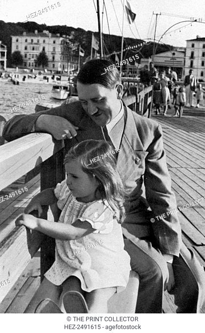 Adolf Hitler and Helga Goebbels, 1936. Nazi leader Hitler (1889-1945) with Helga (1932-1945), the eldest daughter of Reich Propaganda Minister Joseph Goebbels