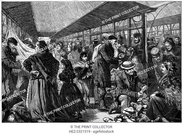 The old clothes exchange, Phil's Building, Houndsditch, London, 1882. A print from The Illustrated London News, 21st January 1882