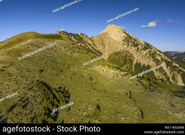 Pedraforca northwest face aerial view in a spring afternoon over Gósol Valley (Barcelona province, Catalonia, Spain, Pyrenees)