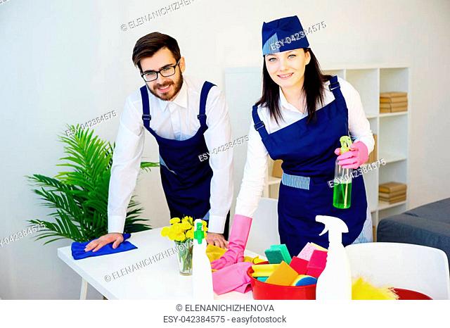 A portrait of a cleaning service team at work