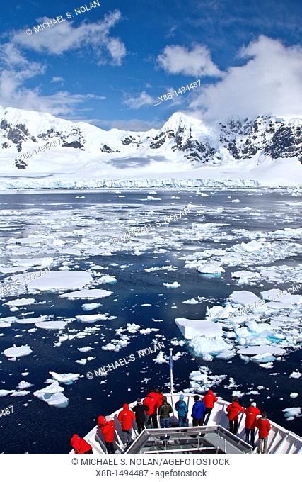 Guests from the Lindblad Expedition ship National Geographic Explorer enjoy the Lemaire Channel in Antarctica  MORE INFO Lindblad Expeditions pioneered...