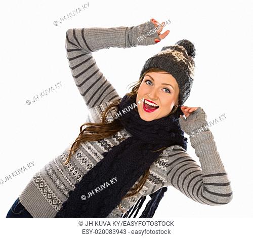 Beautiful young woman wearing woolen outfit, white background