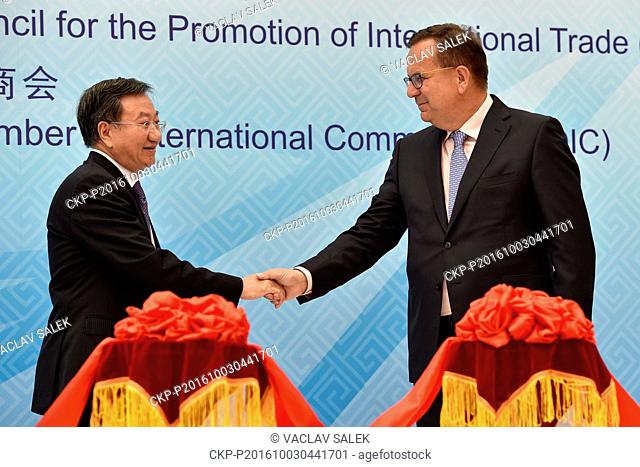 Jiang Zengwei (left), China Vice Minister of Commerce and Jan Mladek (right), Czech Industry and Trade Minister speak at a press conference at the international...