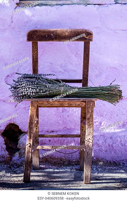 Bundle of dry lavender on authentic vintage brown table