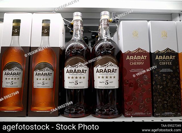 RUSSIA, KAZAN - MAY 31, 2023: Bottles of cognac are for sale in a Lenta grocery store. Yegor Aleyev/TASS