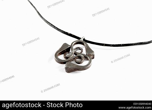 Triskel silver pendant necklace isolated on white background