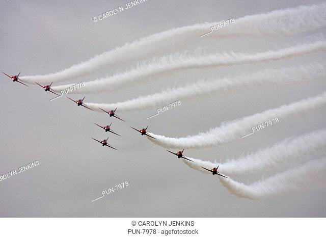 The famous Red Arrows display team flying in formation over Bournemouth Bay in August