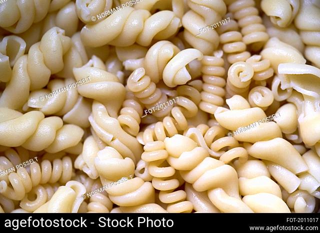 Close up full frame wet corkscrew pasta