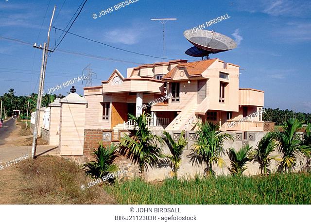 Modern house with satellite dishes installed in Tamil Nadu, India