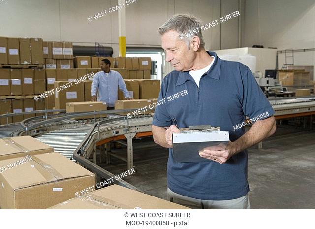 Man working in distribution warehouse