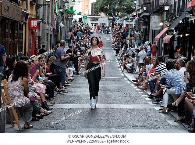 Designer Maria Lafuente holds an outdoor street catwalk for the MFW - Madrid Fashion Week in the neighborhood of La Latina Featuring: Model