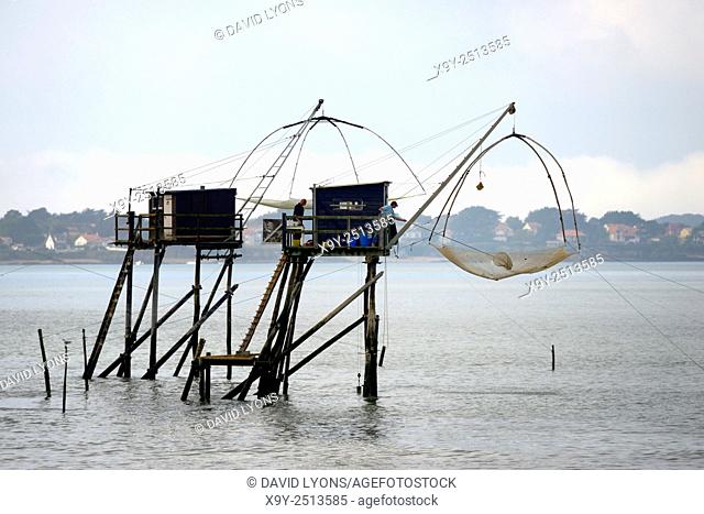 Traditional carrelet lift net fishing hut. Saint-Michel-Chef-Chef beach, Loire-Atlantique, France. Plaice smelt squid sole eel