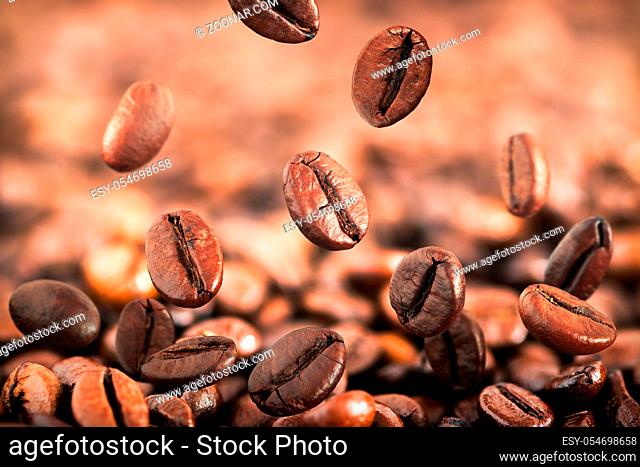 Flying coffee beans or coffee beans Falling