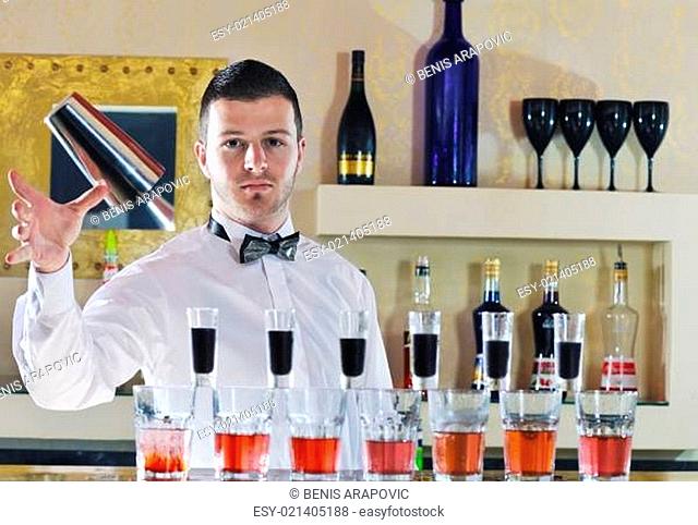 pro barman prepare coctail drink on party