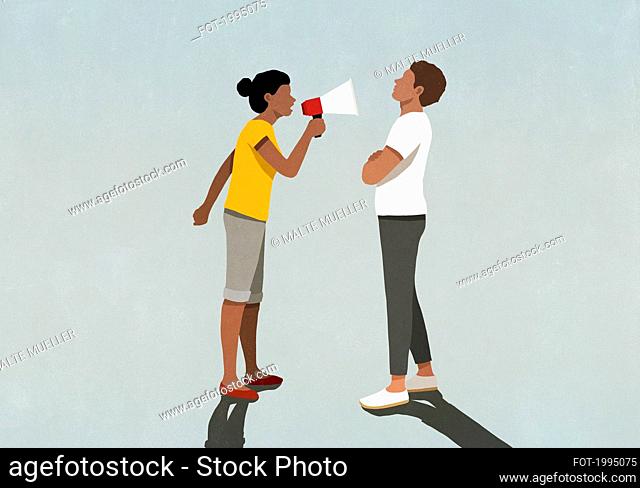 Wife with bullhorn yelling at husband standing with arms crossed