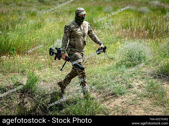 RUSSIA, MOSCOW - JUNE 15, 2023: A Russian Army Central Military District serviceman with a Lobaev LAR-10 semiautomatic rifle is seen during a firearms training...