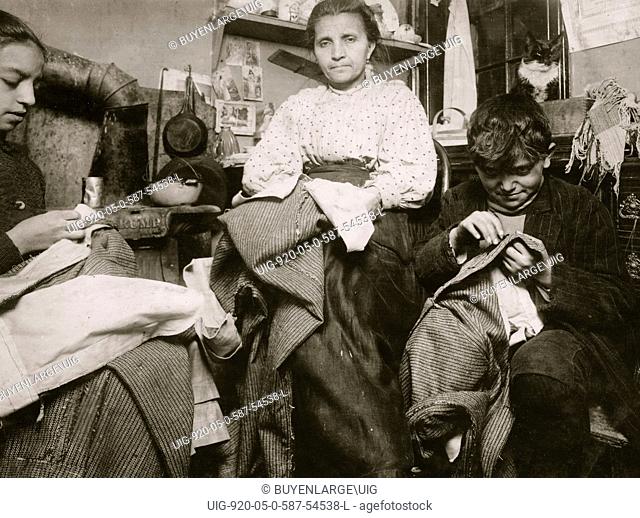 High up on the top floor of a rickety tenements, immigrants 214 Elizabeth St., N.Y., this mother and her two children, boy 10 years old and the girl 12