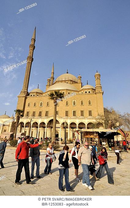 Western tourists in front of Mosque of Muhammad Ali Pasha, Alabaster Mosque, situated in Citadel of Cairo, Egypt, North Africa