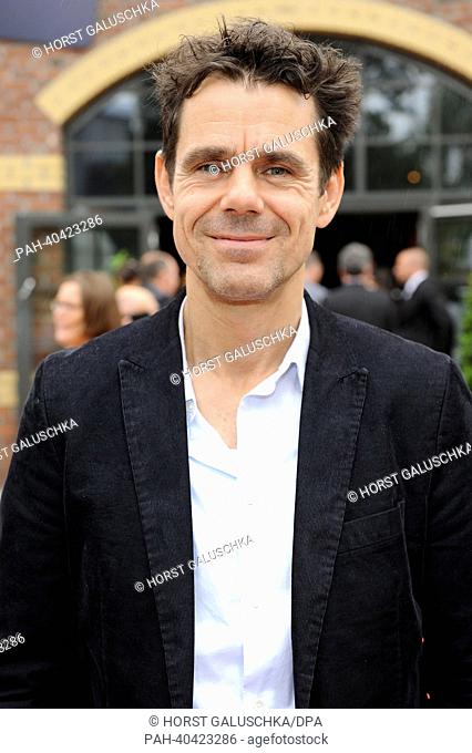 German director Tom Tykwer arrives at the ceremony for the 2013 German Camera Prize in Cologne, Germany, 22 June 2013. Photo: HORTS GALUSCHKA | usage worldwide